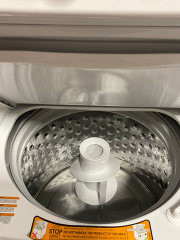 Dryer of model GUD27ESSMWW. Image # 2: GE Unitized Spacemaker® 3.8 cu. ft. Capacity Washer with Stainless Steel Basket and 5.9 cu. ft. Capacity Electric Dryer